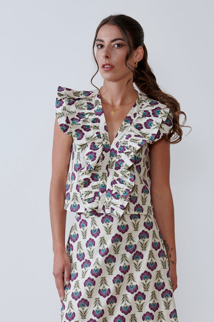 BLUSA ESCOTE V CON VOLANTE