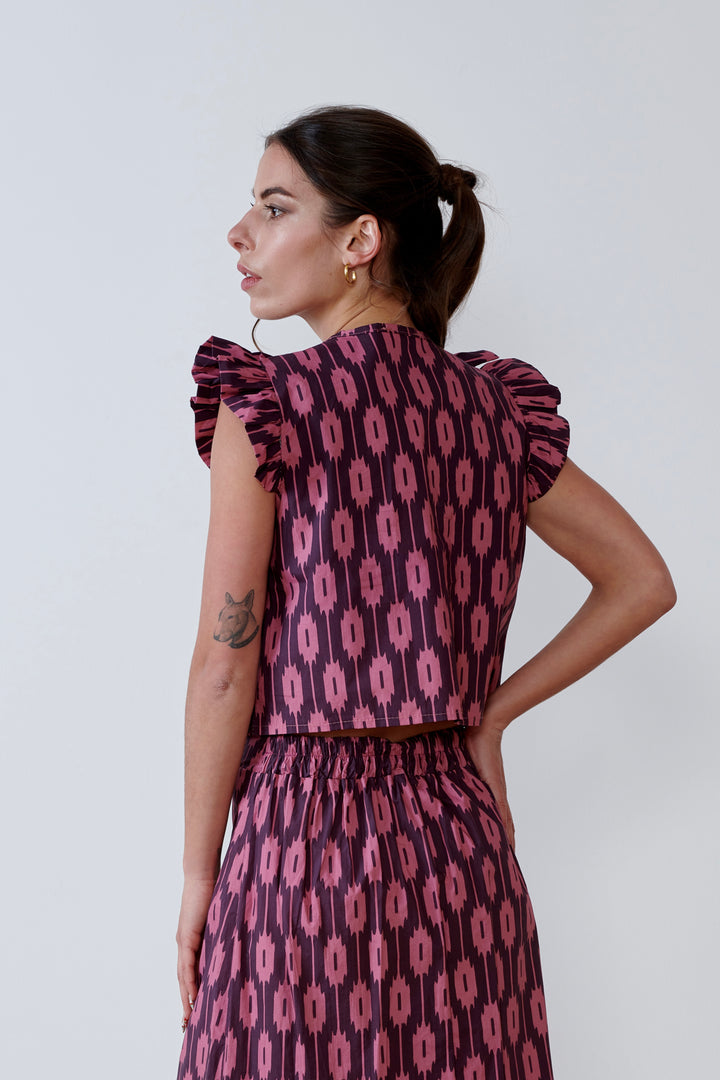 BLUSA ESCOTE V CON VOLANTE