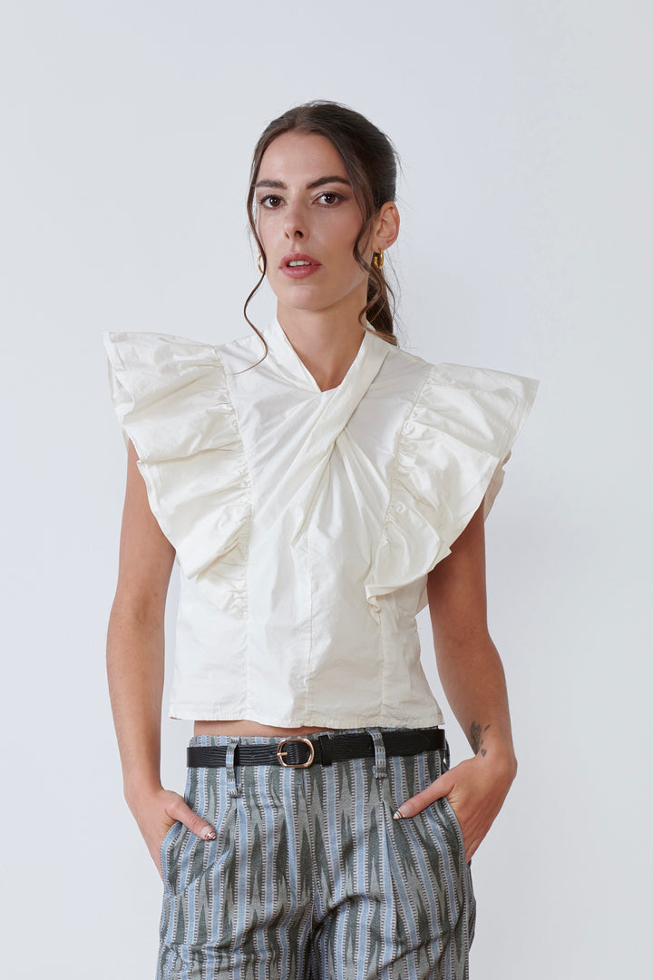 BLUSA CRUZADA CON VOLANTE